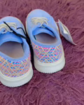 cropped-blue_kids_shoes_02_angled_pair.avif